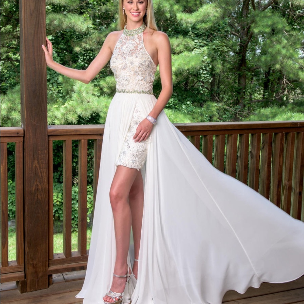 Vienna White High Low Gown with Sleeveless Halter Neckline and High Slit